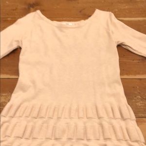 Light pink sweater with cut out back